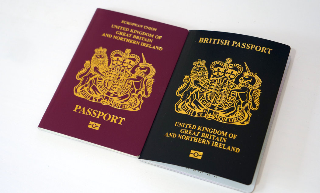 British passports on a white surface